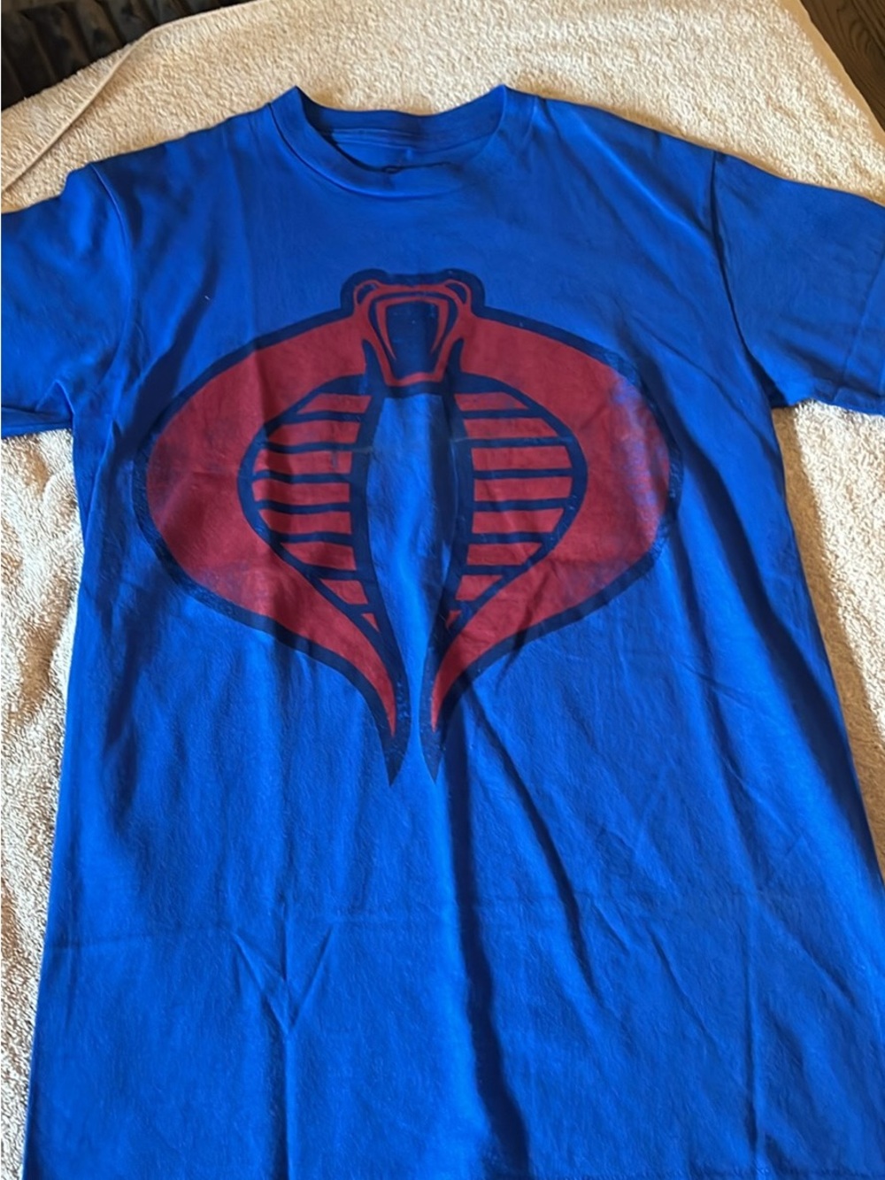 Blue Short Sleeve Graphic Tee with Red Cobra Emblem